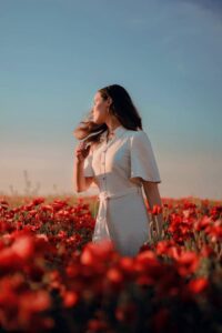 red field of flowers for senior picture location