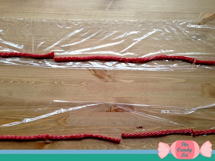 Roll up twizzlers in saran wrap